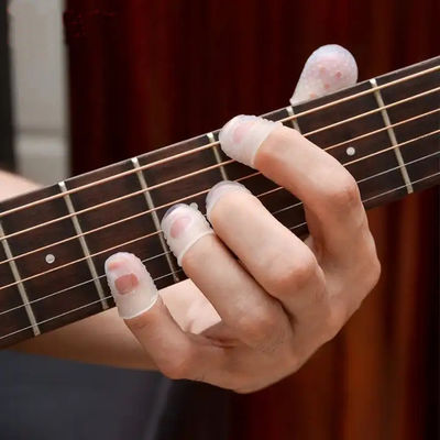 Douille molle calorifuge de protecteur de doigt de silicone pour l'anti douleur de guitare